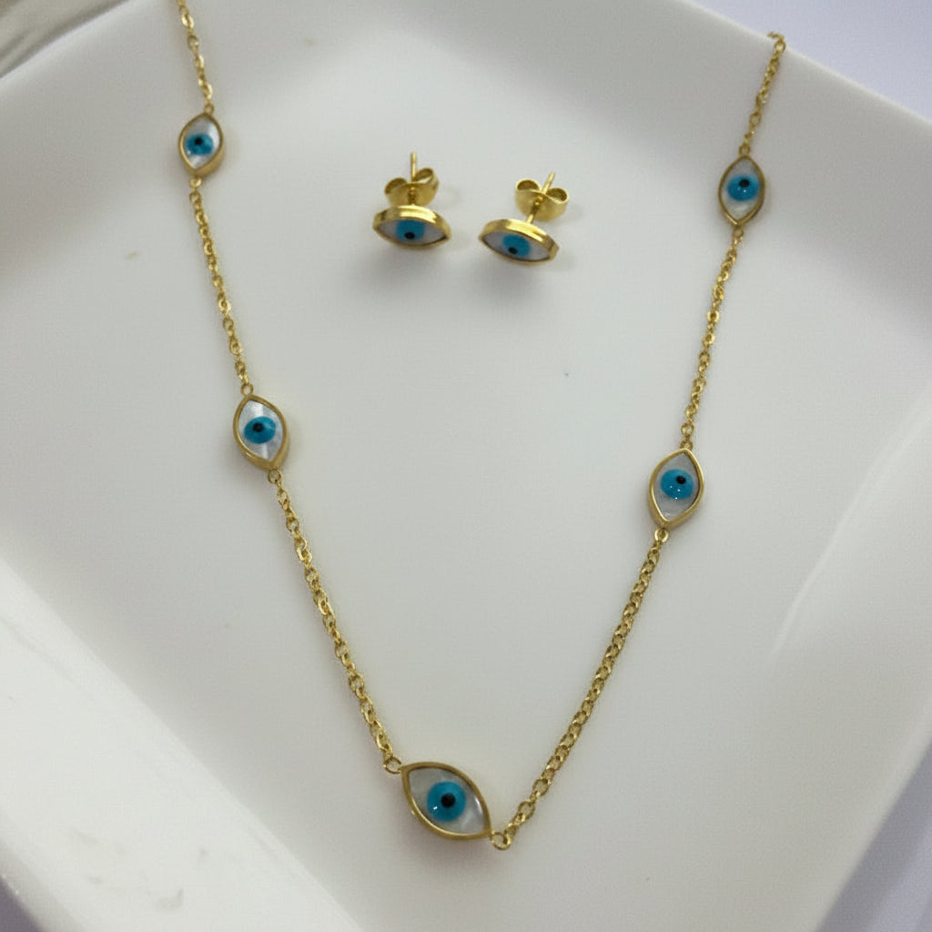 Gold necklace and earrings with blue eye design